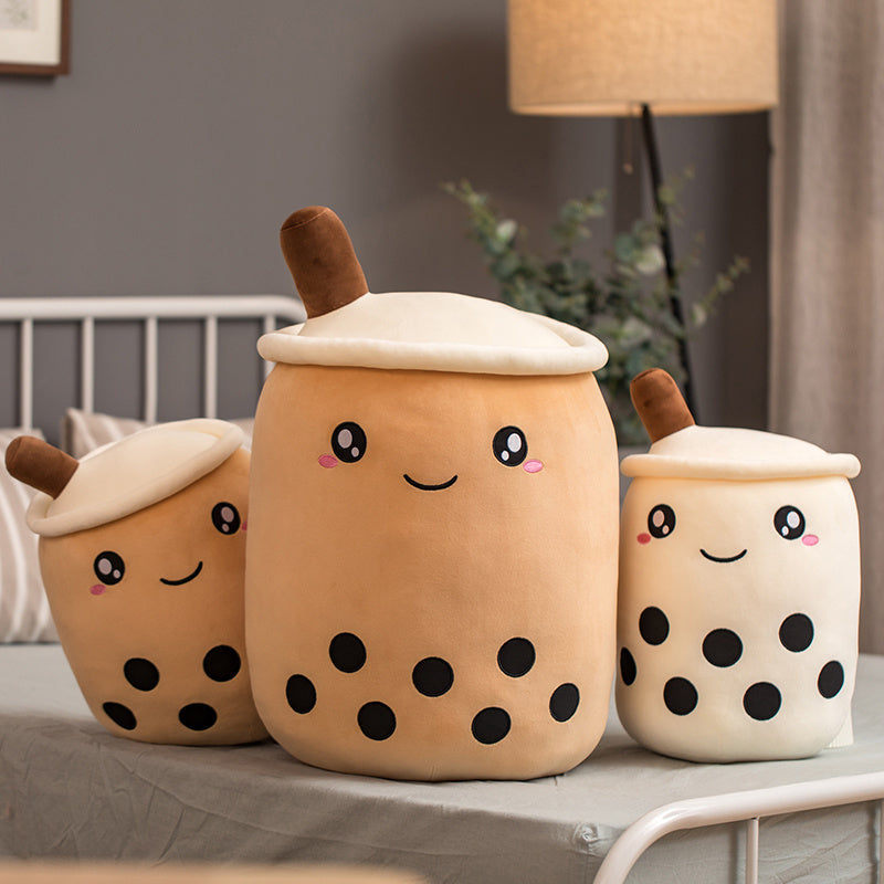 Family of Boba Pals plushies in Mocha Puff, Mocha Mellow, and Vanilla Cloud colors arranged together on a cozy couch in a bedroom, Boba Pals, Bubble tea plushie, Mocha Puff, Mocha Mellow, Vanilla Cloud, Cute drink plushie, Plushies, Plush Dolls, Cute Plush, Plush, Soft Dolls, Toy Dolls, Toy, Toys, Squishy, Soft, Soft Toys, Stuffed Toys, Plush Toy, Plush Toys, Premium, Quality, Adorable, Cuddly, Playful, Collectibles, Huggable, Kids Toys, Children's Gifts, Gift Ideas, Gift, Gifts, Plush, Teddy Bear.